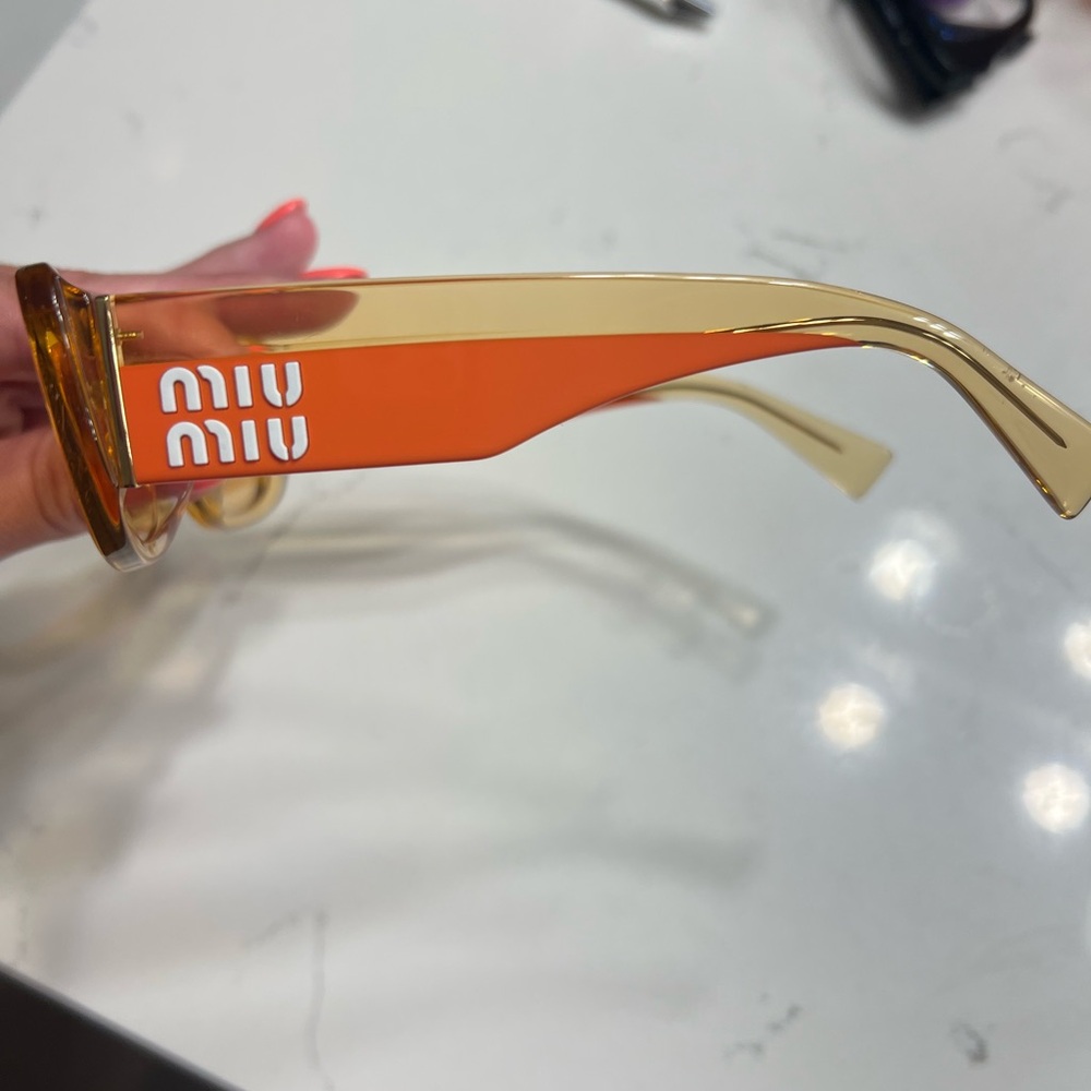 Miu Miu Orange and Gold Sunglasses
